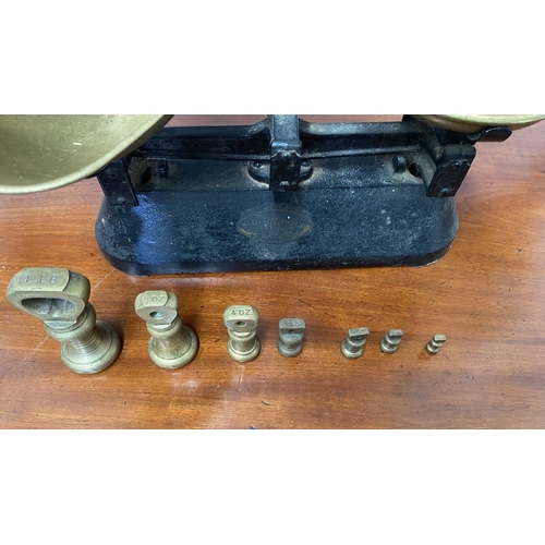 196 - A VINTAGE BRITISH ‘THE VIKING’ WEIGHING SCALES WITH BRASS WEIGHTS, dimensions: scales: 37cm wide app... 
