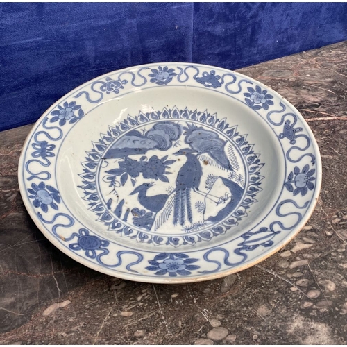 199 - A CHINESE BLUE AND WHITE 'SWATOW' CHARGER of deep circular form, resting atop short foot, late Ming ... 