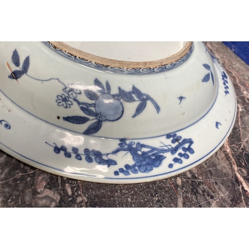 199 - A CHINESE BLUE AND WHITE 'SWATOW' CHARGER of deep circular form, resting atop short foot, late Ming ... 