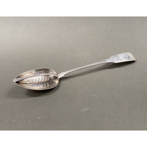 2 - A GEORGE III IRISH SILVER DIVIDER/STRAINER SPOON, Hallmarked with Makers mark Matthew West & Richard... 
