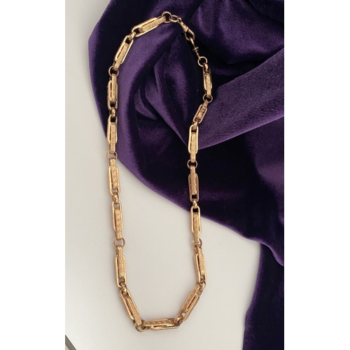 20 - A HEAVY 9CT ROSEGOLD NECKLACE, thick fancy paperclip chain links, each with decorative textured engr... 