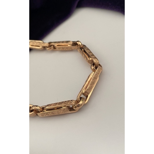 20 - A HEAVY 9CT ROSEGOLD NECKLACE, thick fancy paperclip chain links, each with decorative textured engr... 