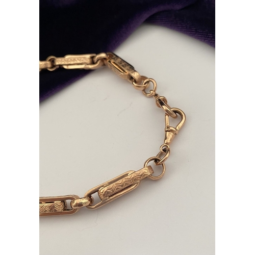 20 - A HEAVY 9CT ROSEGOLD NECKLACE, thick fancy paperclip chain links, each with decorative textured engr... 