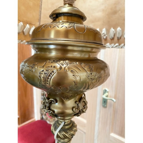 202 - A GILT BRASS FLOOR STANDARD LAMP, highly decorative with engraved details to cylindrical & knopped t... 