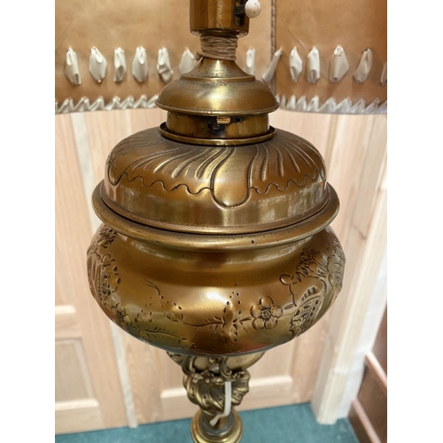 202 - A GILT BRASS FLOOR STANDARD LAMP, highly decorative with engraved details to cylindrical & knopped t... 