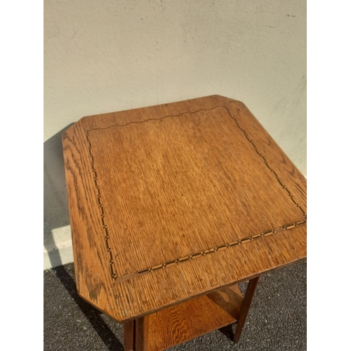 205 - AN OAK ARTS & CRAFTS STYLE SIDE TABLE, with inlay to top, raised on splayed legs with openwork desig... 