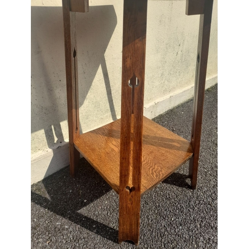 205 - AN OAK ARTS & CRAFTS STYLE SIDE TABLE, with inlay to top, raised on splayed legs with openwork desig... 