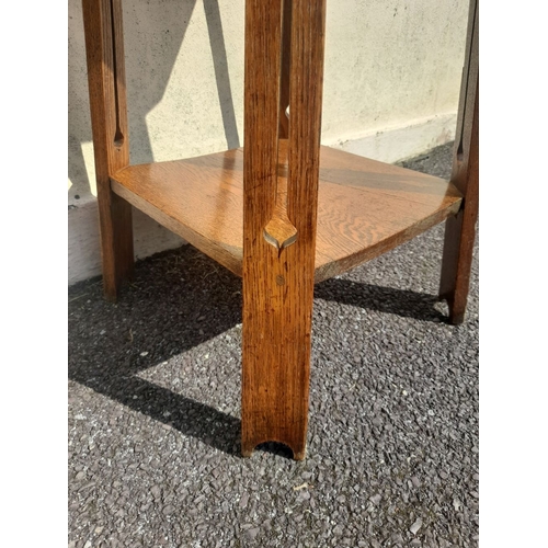 205 - AN OAK ARTS & CRAFTS STYLE SIDE TABLE, with inlay to top, raised on splayed legs with openwork desig... 