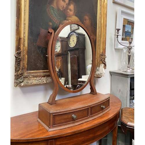 206 - A 19TH CENTURY MAHOGANY DRESSING TABLE MIRROR, oval mirror in scroll supports, atop bow fronted base... 