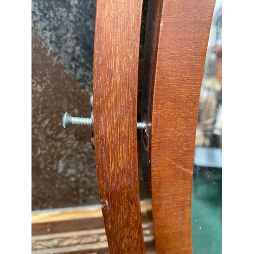 206 - A 19TH CENTURY MAHOGANY DRESSING TABLE MIRROR, oval mirror in scroll supports, atop bow fronted base... 