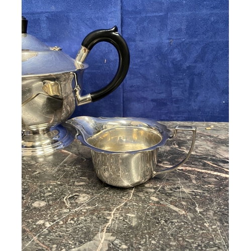208 - A VINTAGE SILVER-PLATED LOT TO INCLUDE, a double handled tray with highly engraved top, the base eng... 