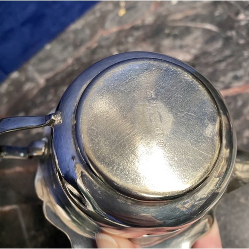 208 - A VINTAGE SILVER-PLATED LOT TO INCLUDE, a double handled tray with highly engraved top, the base eng... 