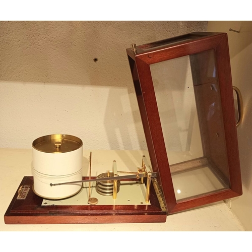 212 - A HARDWOOD CASED MARINE BAROGRAPH, with carrying handle to top. Dimensions: 30cm long x 17cm high x ... 