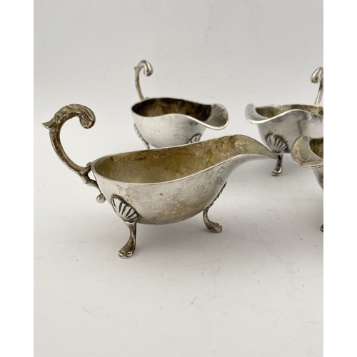 217 - A SILVERPLATE LOT TO INCLUDE: A SET OF FOUR VINTAGE HEAVY SILVER-PLATE SAUCE BOATS, VINTAGE SILVER-P... 