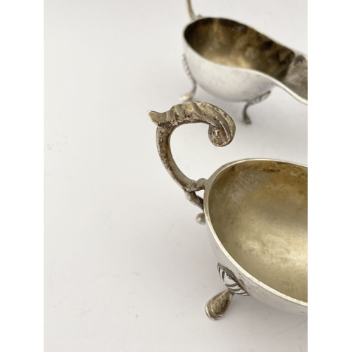 217 - A SILVERPLATE LOT TO INCLUDE: A SET OF FOUR VINTAGE HEAVY SILVER-PLATE SAUCE BOATS, VINTAGE SILVER-P... 