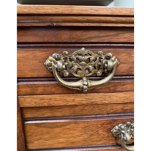 218 - A MAHOGANY APPRENTICE THREE DRAWER CHEST, with two short over one long drawer, each with brass handl... 