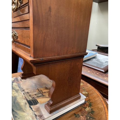218 - A MAHOGANY APPRENTICE THREE DRAWER CHEST, with two short over one long drawer, each with brass handl... 