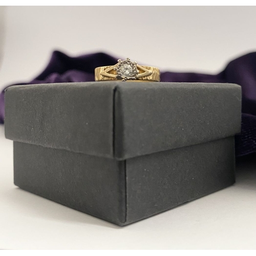 22 - AN ATTRACTIVE 18CT GOLD DIAMOND SOLITAIRE RING, central round cut diamond in decorative raised claw ... 