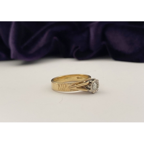 22 - AN ATTRACTIVE 18CT GOLD DIAMOND SOLITAIRE RING, central round cut diamond in decorative raised claw ... 