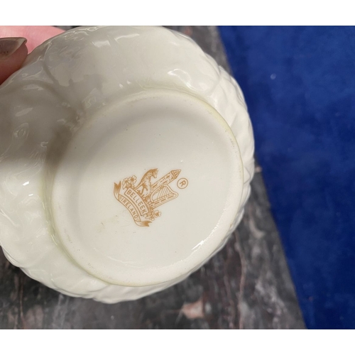 221 - A COLLECTION OF BELLEEK, to include cream jug, three sugar bowls two matching, a vase & pair of swan... 