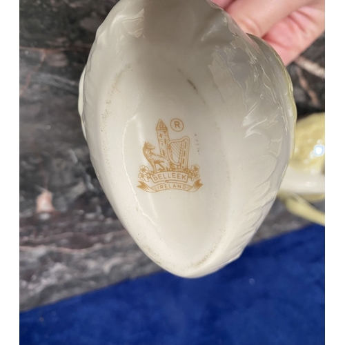 221 - A COLLECTION OF BELLEEK, to include cream jug, three sugar bowls two matching, a vase & pair of swan... 