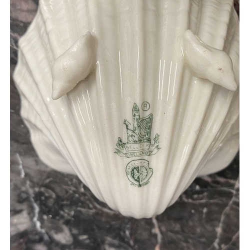 221 - A COLLECTION OF BELLEEK, to include cream jug, three sugar bowls two matching, a vase & pair of swan... 