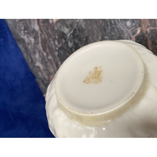 221 - A COLLECTION OF BELLEEK, to include cream jug, three sugar bowls two matching, a vase & pair of swan... 