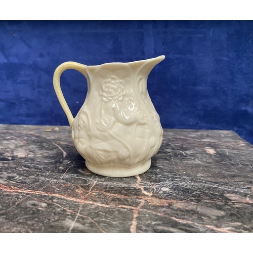 221 - A COLLECTION OF BELLEEK, to include cream jug, three sugar bowls two matching, a vase & pair of swan... 