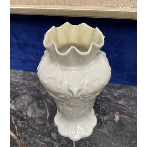 221 - A COLLECTION OF BELLEEK, to include cream jug, three sugar bowls two matching, a vase & pair of swan... 