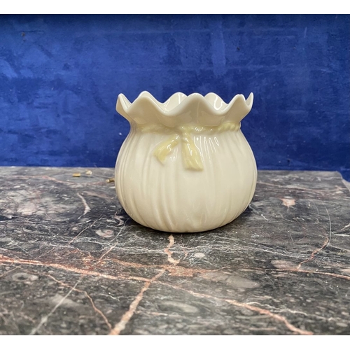 221 - A COLLECTION OF BELLEEK, to include cream jug, three sugar bowls two matching, a vase & pair of swan... 