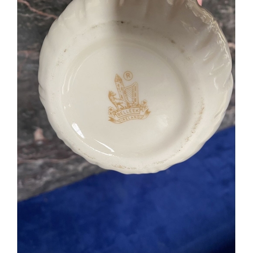 221 - A COLLECTION OF BELLEEK, to include cream jug, three sugar bowls two matching, a vase & pair of swan... 