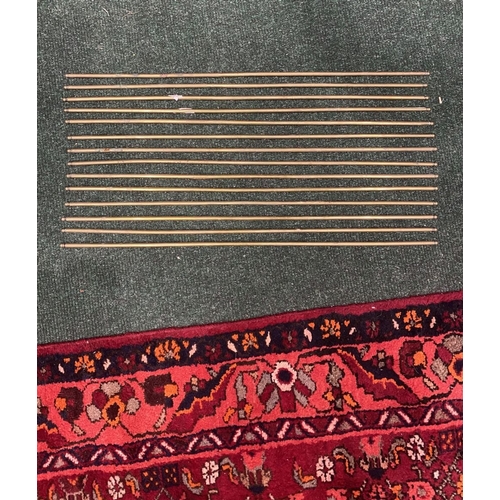 227 - A SET OF 13 BRASS STAIR RODS, condition as photographed, dimensions: 62.5cm long approx.