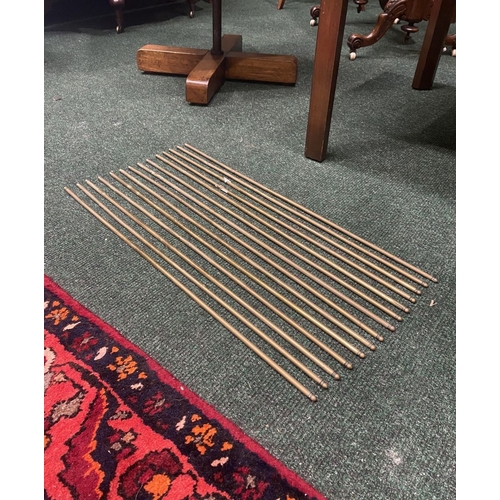 227 - A SET OF 13 BRASS STAIR RODS, condition as photographed, dimensions: 62.5cm long approx.