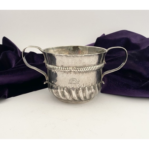 23 - AN EARLY GEORGE I SILVER PORRINGER BOWL, Hallmarked with Makers mark James Goodwin, London c.1714. T... 