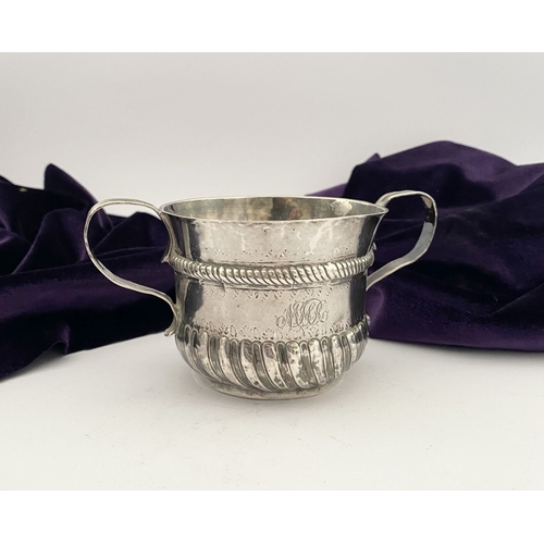 23 - AN EARLY GEORGE I SILVER PORRINGER BOWL, Hallmarked with Makers mark James Goodwin, London c.1714. T... 