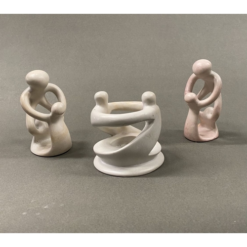 233 - A TRIO OF CARVED SOAPSTONE SCULPTURES, central ‘unity’/’circle of friends’ can be used as a tealight... 