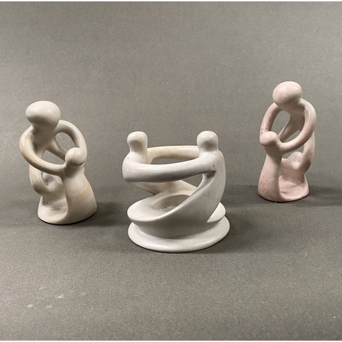 233 - A TRIO OF CARVED SOAPSTONE SCULPTURES, central ‘unity’/’circle of friends’ can be used as a tealight... 
