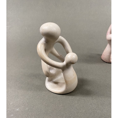 233 - A TRIO OF CARVED SOAPSTONE SCULPTURES, central ‘unity’/’circle of friends’ can be used as a tealight... 