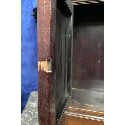 234 - AN ANTIQUE MAHOGANY HANGING CABINET, with shaped reeded border to top above two panelled doors over ... 