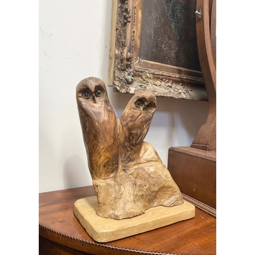 235 - A HARDWOOD CARVED OWL SCULPTURE, carved from one piece of wood, the owls with beaded eyes. On rectan... 
