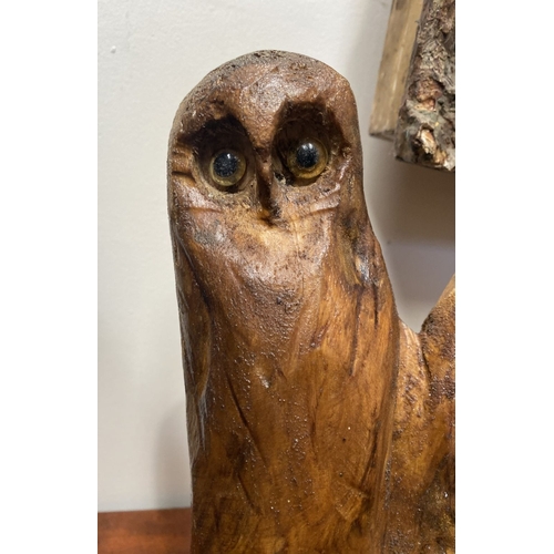 235 - A HARDWOOD CARVED OWL SCULPTURE, carved from one piece of wood, the owls with beaded eyes. On rectan... 