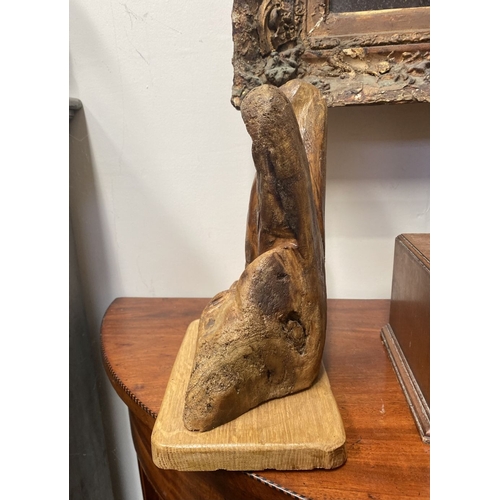 235 - A HARDWOOD CARVED OWL SCULPTURE, carved from one piece of wood, the owls with beaded eyes. On rectan... 