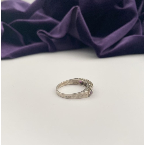 241 - A LOVELY SILVER OPAL & PINK GEMSTONE SEVEN STONE RING, with four round cut pink gemstones separated ... 