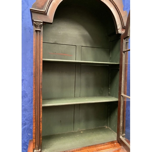 25 - A MAHOGANY QUEEN ANNE STYLE BUREAU BOOKCASE, the carved pediment to arched top with shell motif to c... 