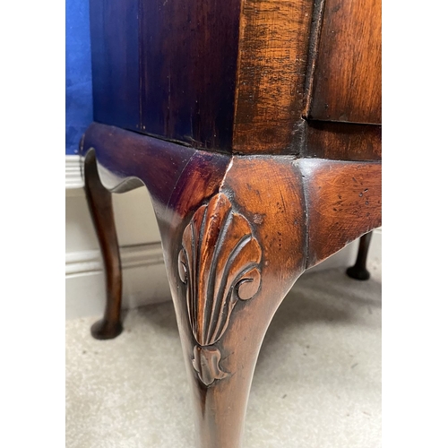 25 - A MAHOGANY QUEEN ANNE STYLE BUREAU BOOKCASE, the carved pediment to arched top with shell motif to c... 