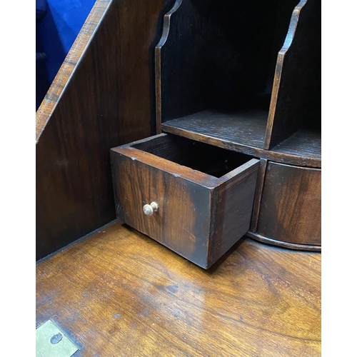 25 - A MAHOGANY QUEEN ANNE STYLE BUREAU BOOKCASE, the carved pediment to arched top with shell motif to c... 