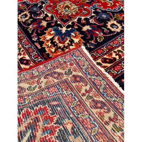 252 - AN EXCELLENT PERSIAN MASHAD RUG, hand knotted, high knot density, dyed using natural vegetable dyes.... 