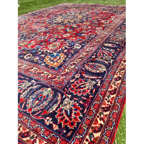 252 - AN EXCELLENT PERSIAN MASHAD RUG, hand knotted, high knot density, dyed using natural vegetable dyes.... 