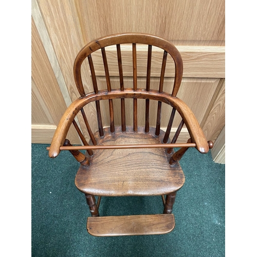 256 - A 19TH CENTURY HARDWOOD CHILDREN’S HIGHCHAIR, c.1820. Winsor style chair, with hoop back and spindle... 