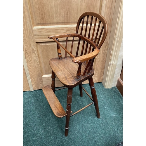 256 - A 19TH CENTURY HARDWOOD CHILDREN’S HIGHCHAIR, c.1820. Winsor style chair, with hoop back and spindle... 